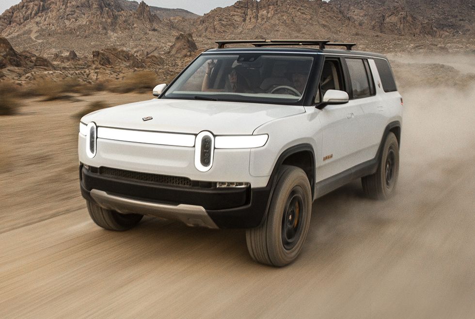Rivian R1s on road.