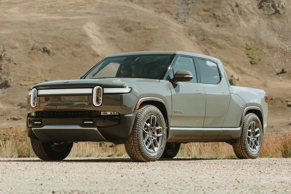 Rivian R1T on road.