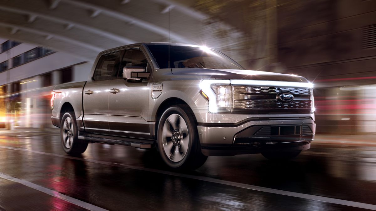 Ford F150 Lightning on road.